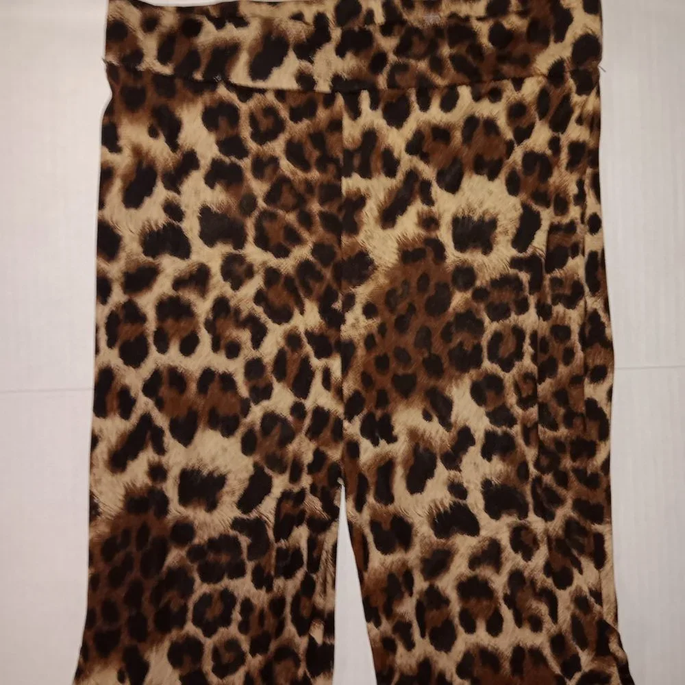 FASHION NOVA SHEER FLARE LEG ANIMAL PRINT PANTS SIZE SMALL